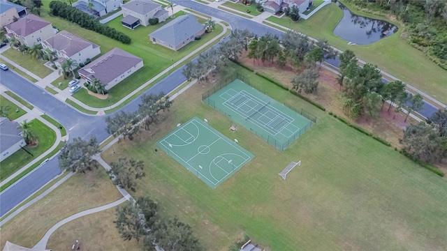 aerial view with a water view and a residential view