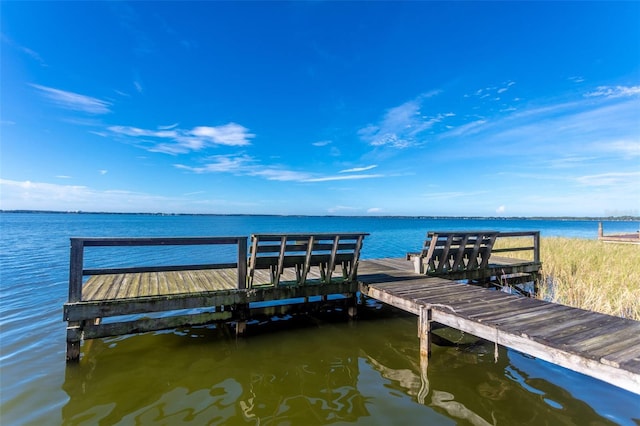 view of dock with a water view