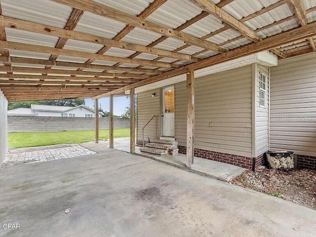 view of patio / terrace with entry steps and fence