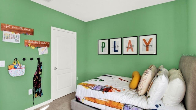 bedroom featuring carpet