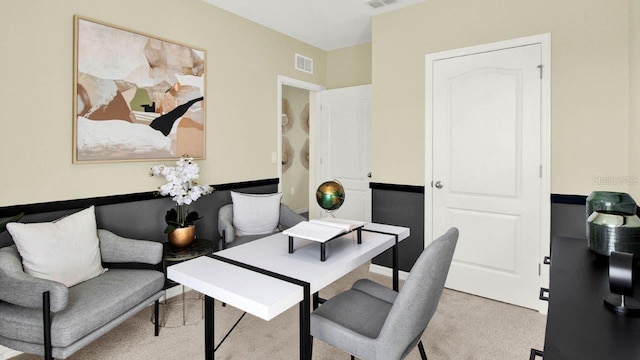 home office featuring light carpet and visible vents