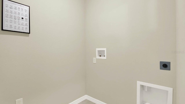 clothes washing area featuring laundry area, baseboards, washer hookup, and hookup for an electric dryer