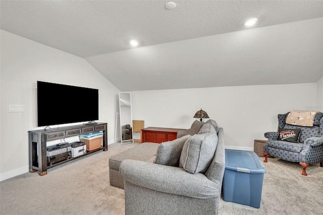 living room with carpet floors, baseboards, vaulted ceiling, and a textured ceiling