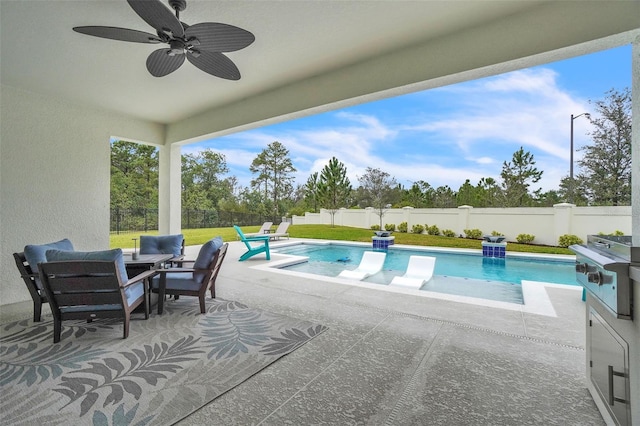 view of pool featuring a fenced in pool, a patio, ceiling fan, a fenced backyard, and grilling area