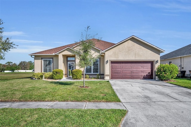 ranch-style home featuring a garage, a front yard, concrete driveway, and stucco siding