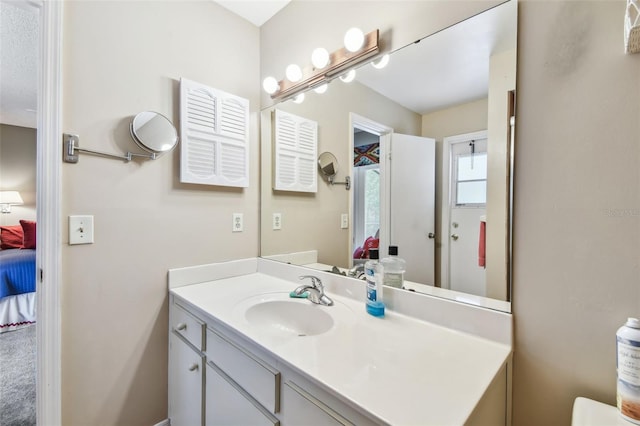 ensuite bathroom with vanity and ensuite bathroom