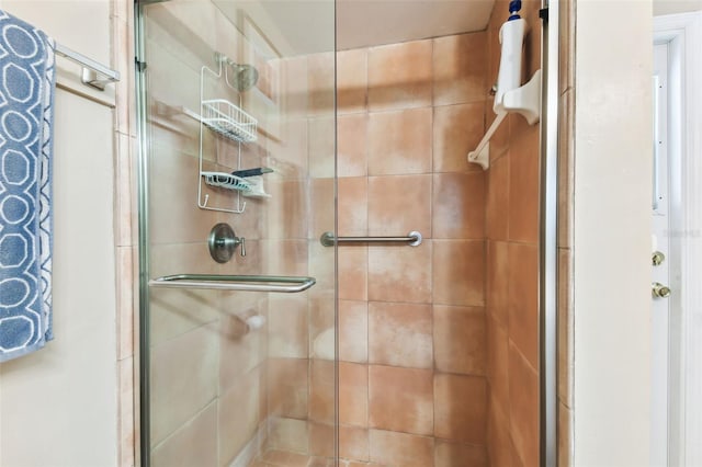 full bathroom with a shower stall