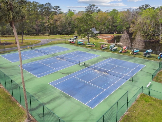 view of tennis court with fence