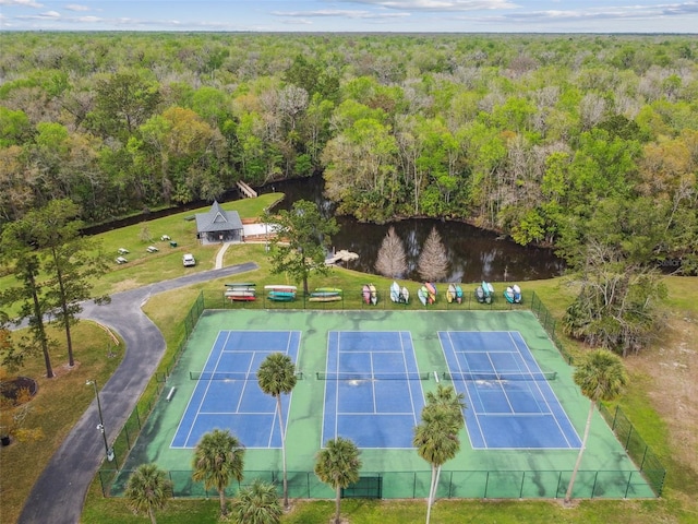 drone / aerial view with a view of trees