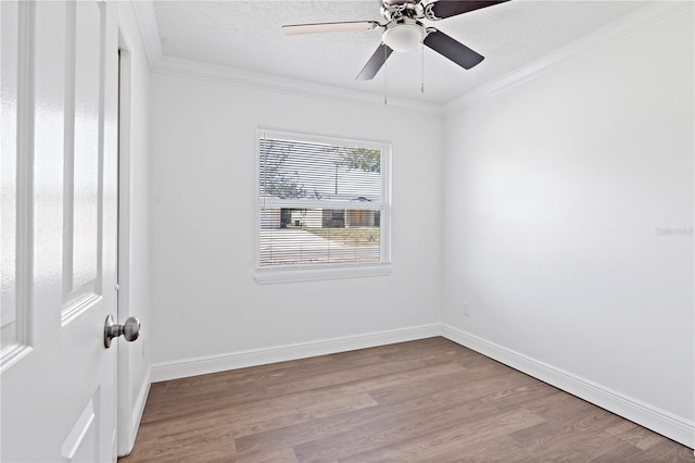 unfurnished room with light wood-style flooring, ornamental molding, ceiling fan, a textured ceiling, and baseboards