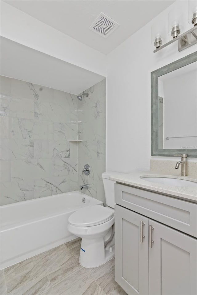 full bath with toilet, vanity, shower / tub combination, and visible vents