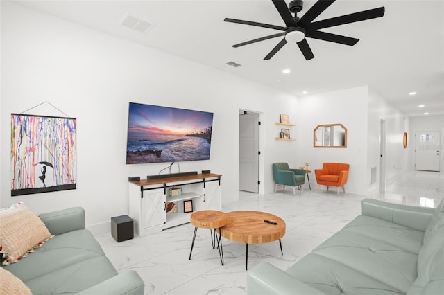 living room featuring marble finish floor, a ceiling fan, visible vents, and recessed lighting