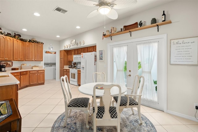 dining room with visible vents, washer and clothes dryer, light tile patterned floors, recessed lighting, and french doors