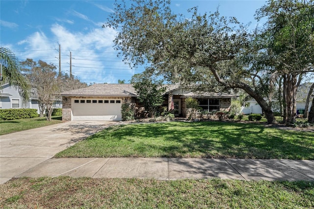 ranch-style home with driveway, a front lawn, an attached garage, and stone siding