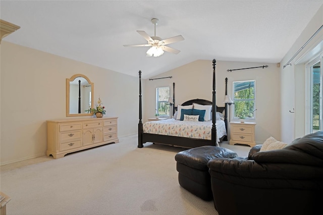 bedroom featuring vaulted ceiling, light carpet, a ceiling fan, and baseboards