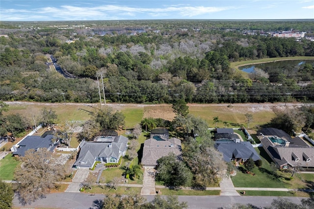 bird's eye view with a water view and a residential view