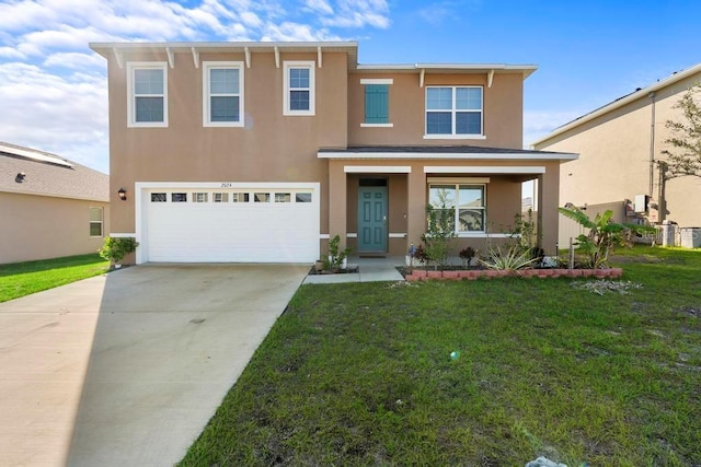 view of front of home with a garage, concrete driveway, stucco siding, covered porch, and a front yard