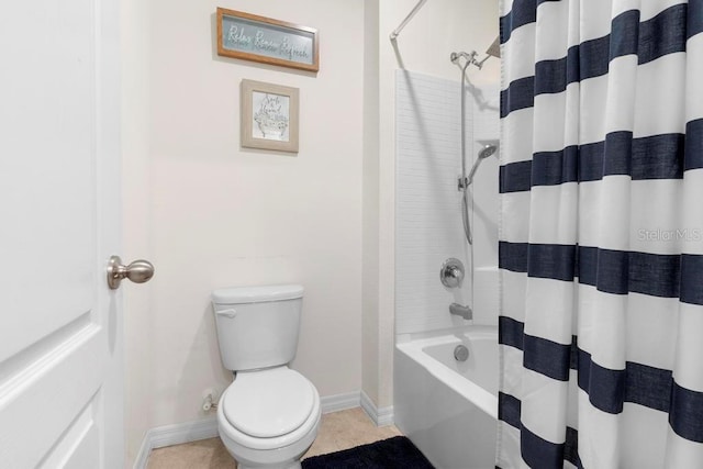 bathroom featuring shower / tub combo, tile patterned flooring, toilet, and baseboards