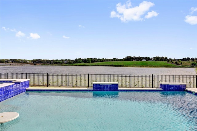 view of pool with a fenced in pool, a water view, and fence