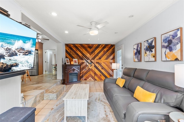 living area with ceiling fan, light tile patterned floors, and recessed lighting