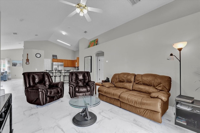 living area featuring arched walkways, ceiling fan, lofted ceiling, visible vents, and marble finish floor