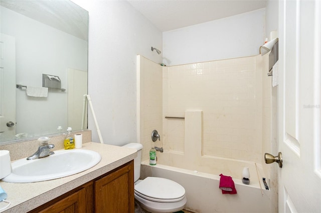 bathroom featuring toilet,  shower combination, and vanity