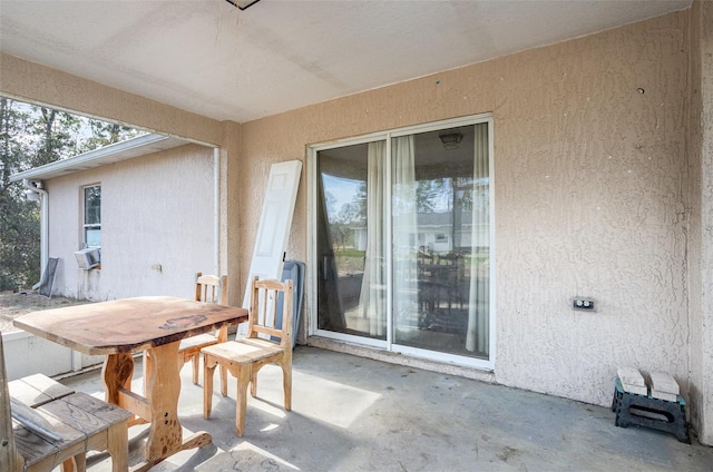 view of patio / terrace featuring outdoor dining space and cooling unit