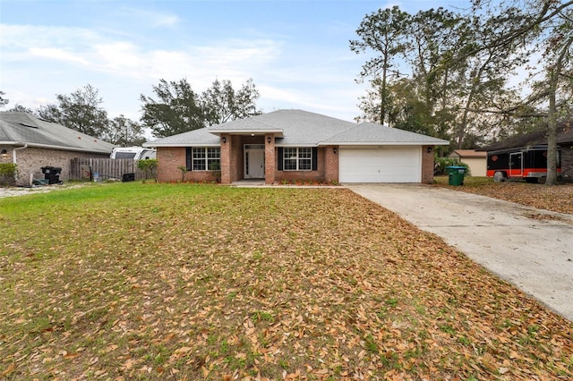 view of front of property with a garage, fence, a front lawn, and concrete driveway