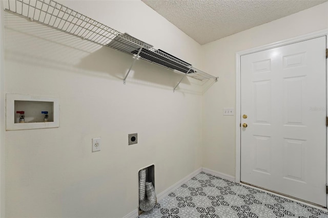 washroom featuring laundry area, baseboards, hookup for a washing machine, a textured ceiling, and hookup for an electric dryer