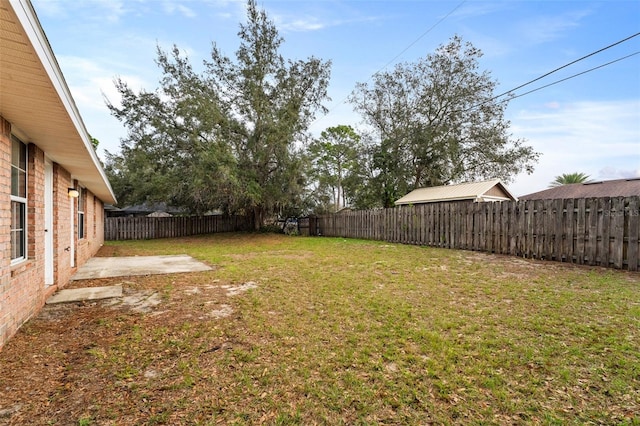 view of yard featuring a fenced backyard