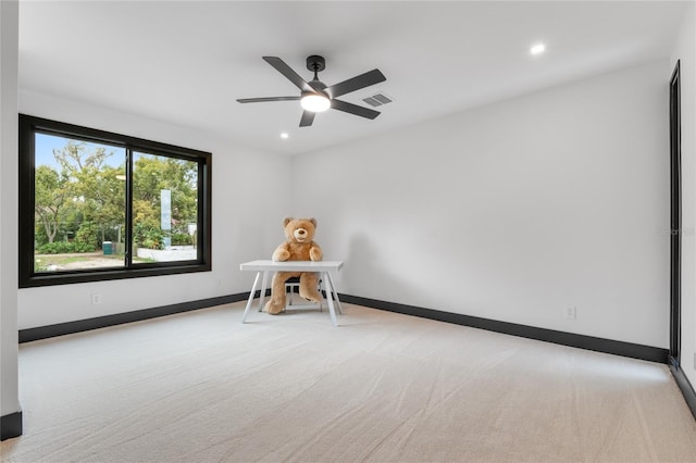 carpeted empty room featuring baseboards, visible vents, ceiling fan, and recessed lighting