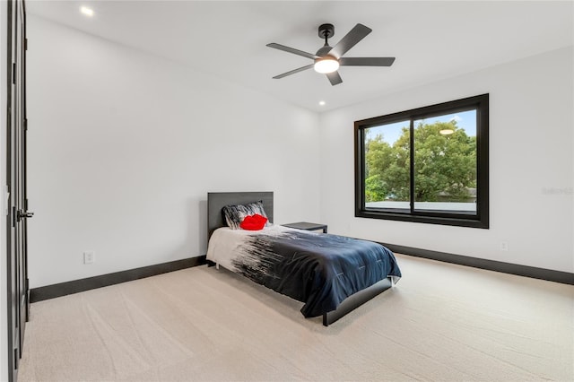 bedroom featuring carpet, baseboards, ceiling fan, and recessed lighting