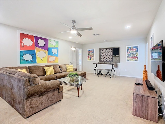 living area with ceiling fan, recessed lighting, carpet floors, visible vents, and baseboards