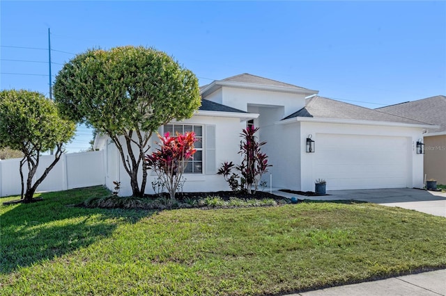 ranch-style home featuring stucco siding, concrete driveway, an attached garage, a front yard, and fence