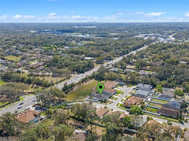 birds eye view of property with a residential view