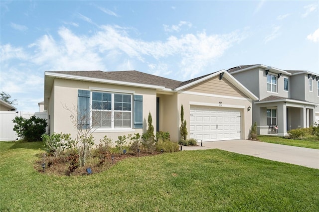 view of front facade with an attached garage, concrete driveway, and a front yard