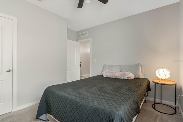 bedroom featuring light carpet, ceiling fan, visible vents, and baseboards