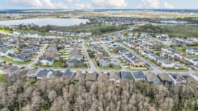 aerial view with a water view and a residential view