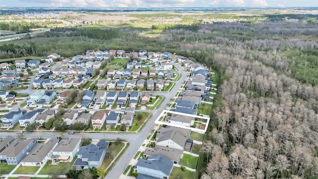 birds eye view of property with a residential view