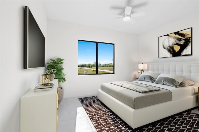 bedroom with marble finish floor and a ceiling fan