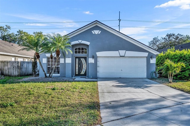 single story home featuring an attached garage, fence, driveway, stucco siding, and a front lawn