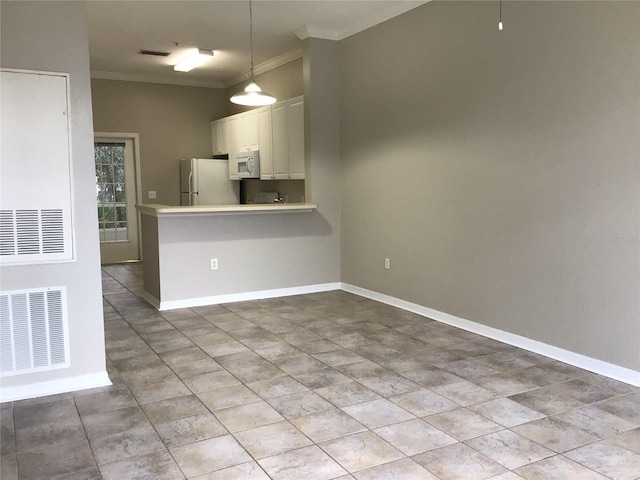 kitchen featuring white appliances, white cabinetry, visible vents, and ornamental molding