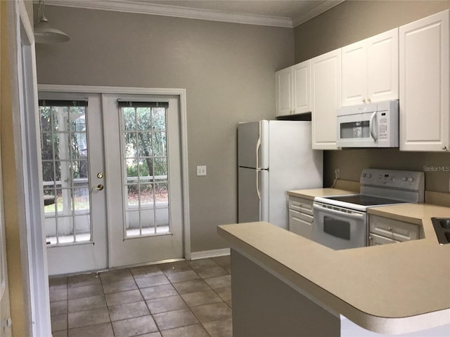 kitchen featuring french doors, light countertops, ornamental molding, white cabinetry, and white appliances