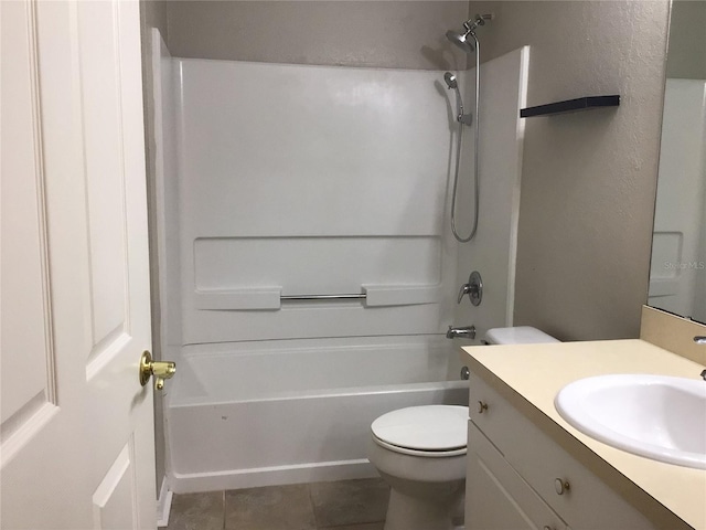 full bath featuring tub / shower combination, vanity, toilet, and tile patterned floors