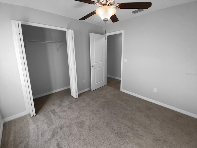 unfurnished bedroom featuring a closet, light colored carpet, visible vents, ceiling fan, and baseboards