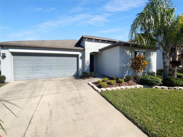 view of front facade featuring driveway, a front yard, an attached garage, and stucco siding