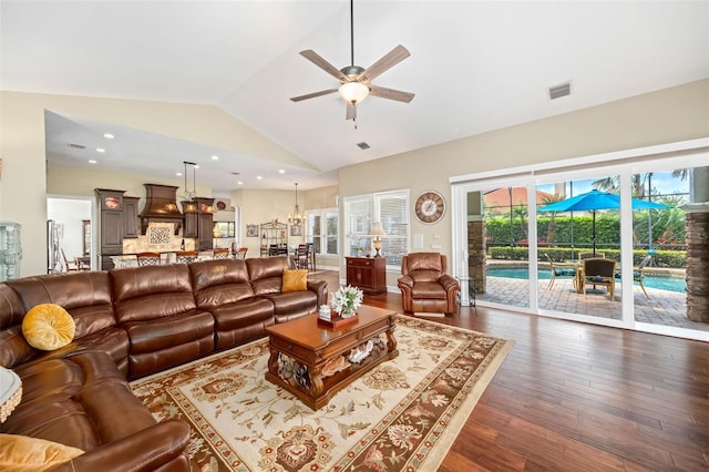 living room with lofted ceiling, recessed lighting, dark wood-type flooring, visible vents, and a ceiling fan