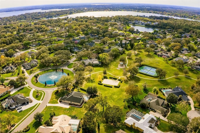 drone / aerial view with a residential view and a water view