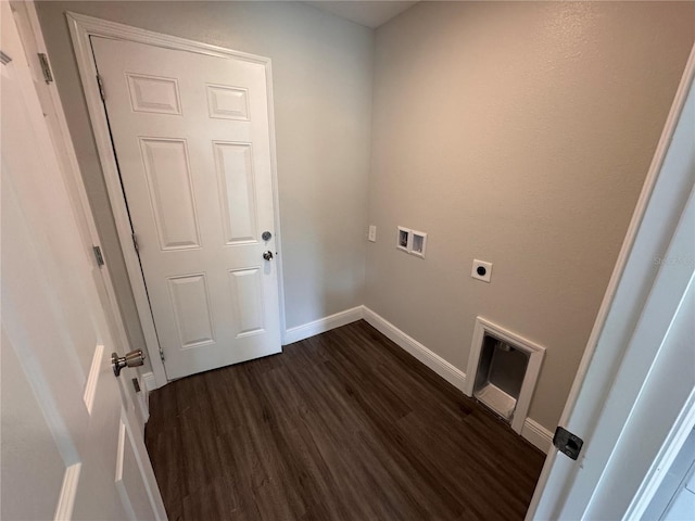 clothes washing area with hookup for an electric dryer, laundry area, dark wood-type flooring, washer hookup, and baseboards