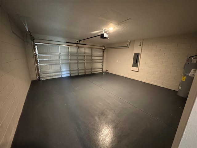 garage featuring a garage door opener, concrete block wall, electric panel, and water heater